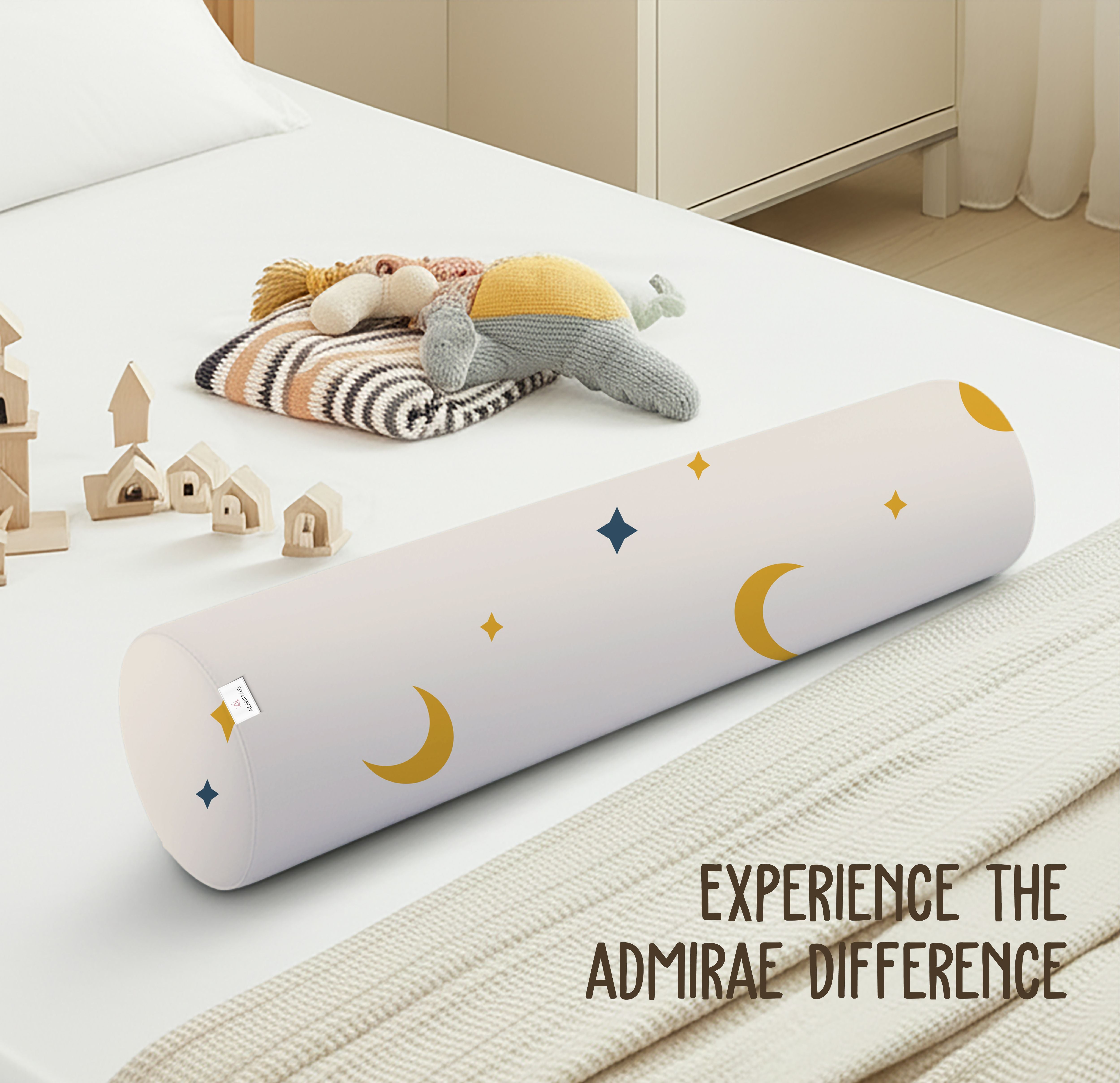 ADMIRAE Baby Bolster Pillow with moon and star pattern on a white bed for infant comfort