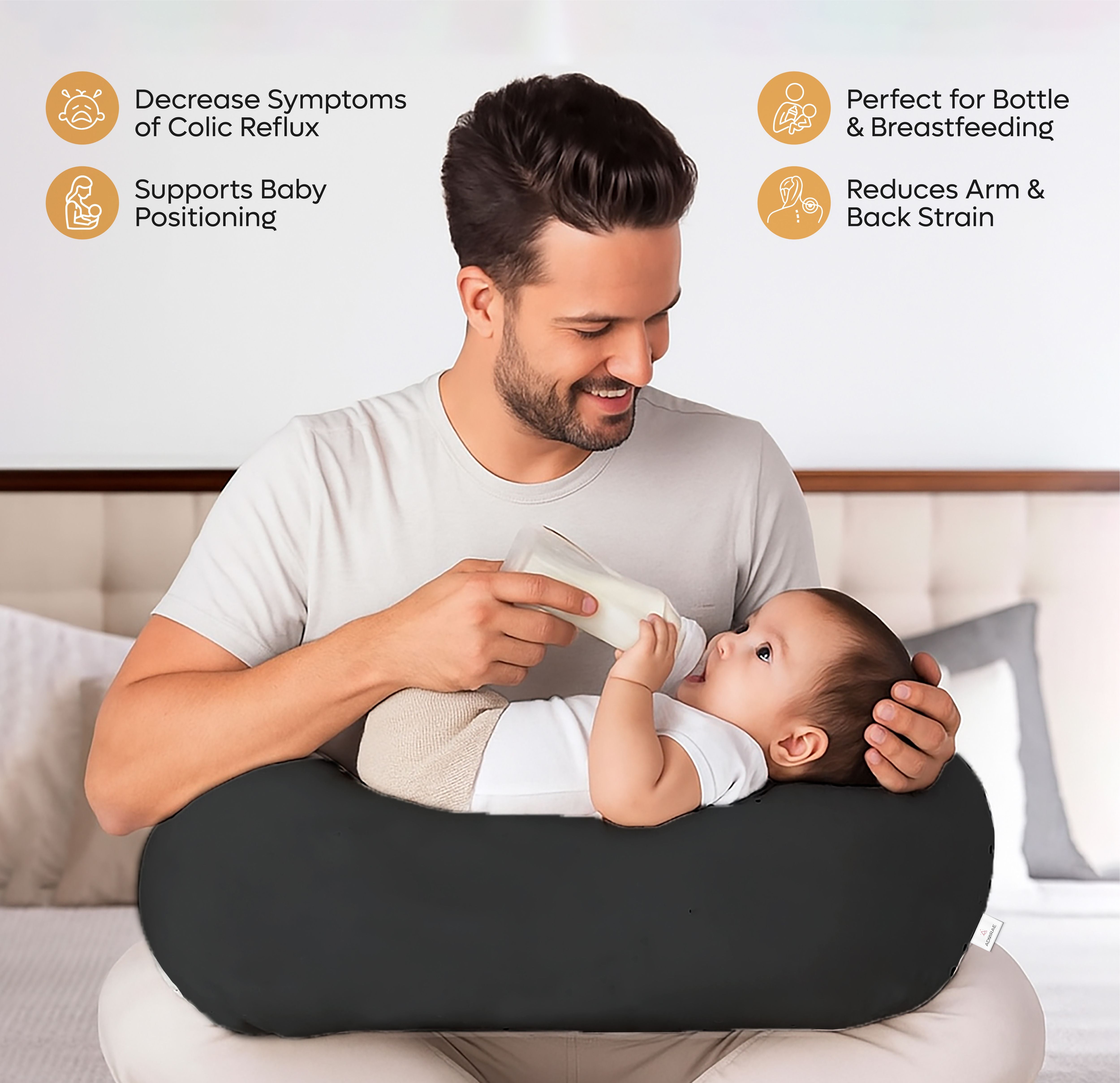 ADMIRAE Baby Feeding Pillow in black supporting baby during bottle feeding with a smiling father