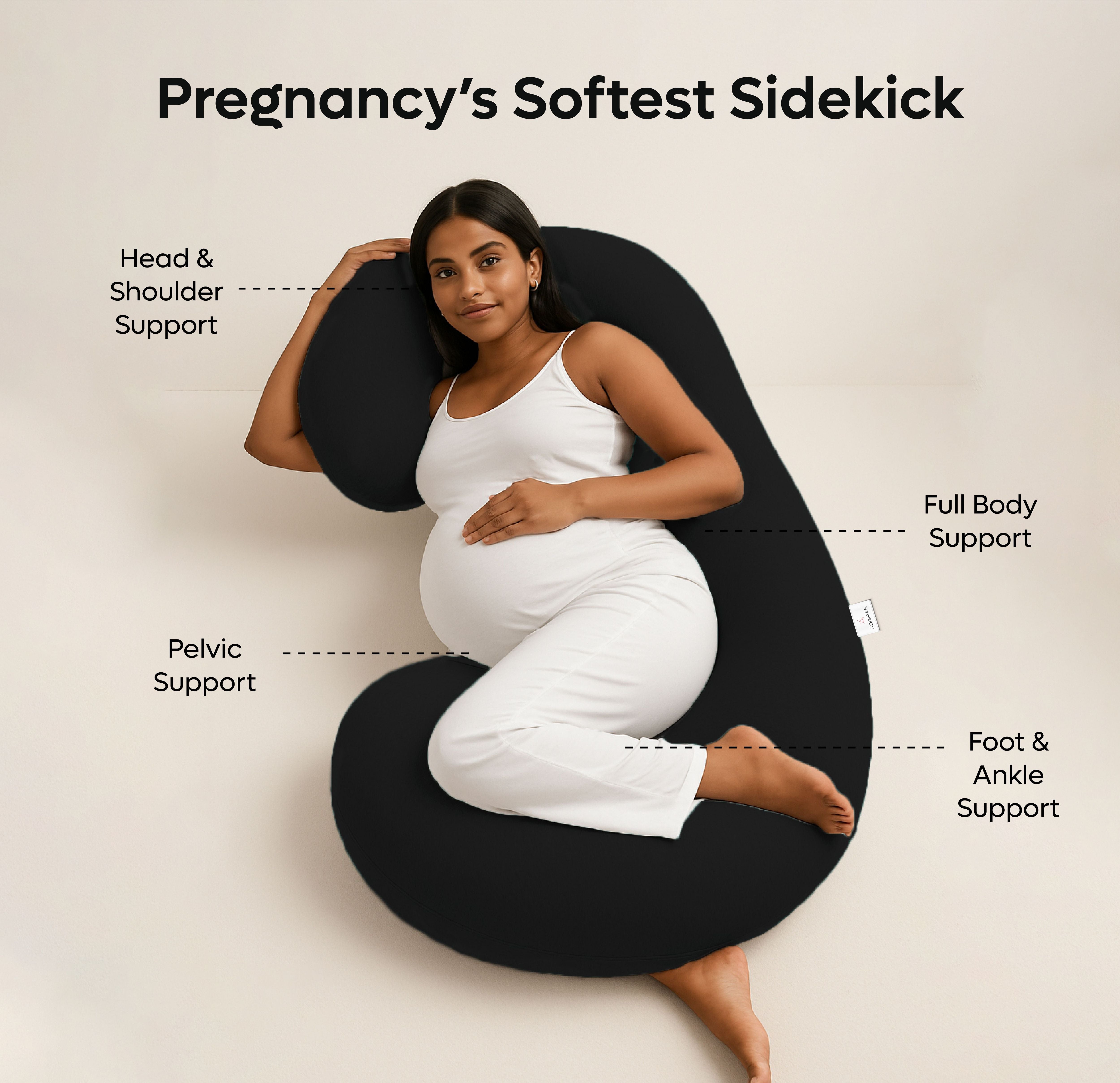 Pregnant woman using ADMIRAE black C shape pregnancy pillow providing head shoulder pelvic and full body support