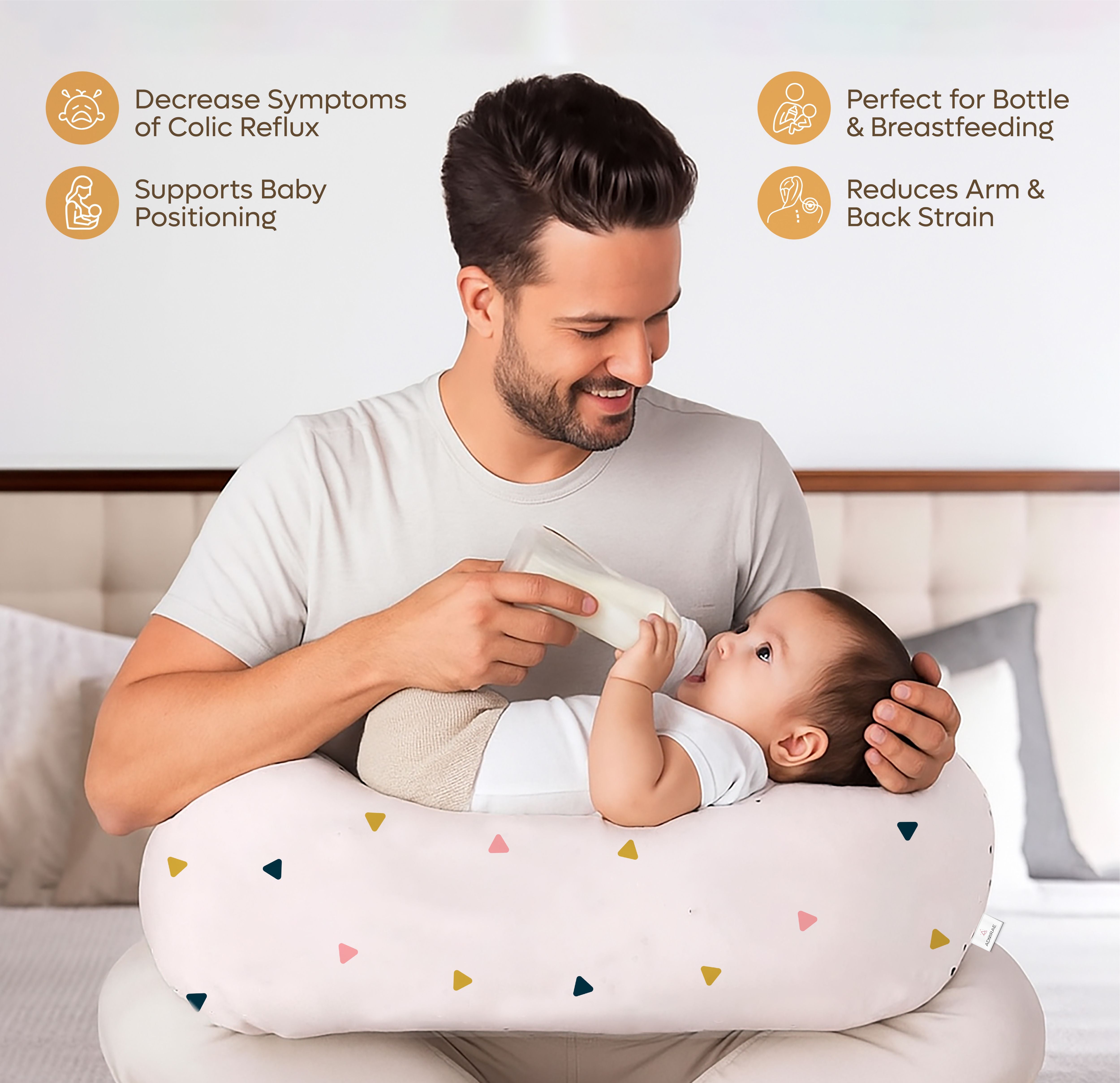 ADMIRAE Feeding Pillow in light design supporting baby while man bottle-feeds infant reducing arm strain