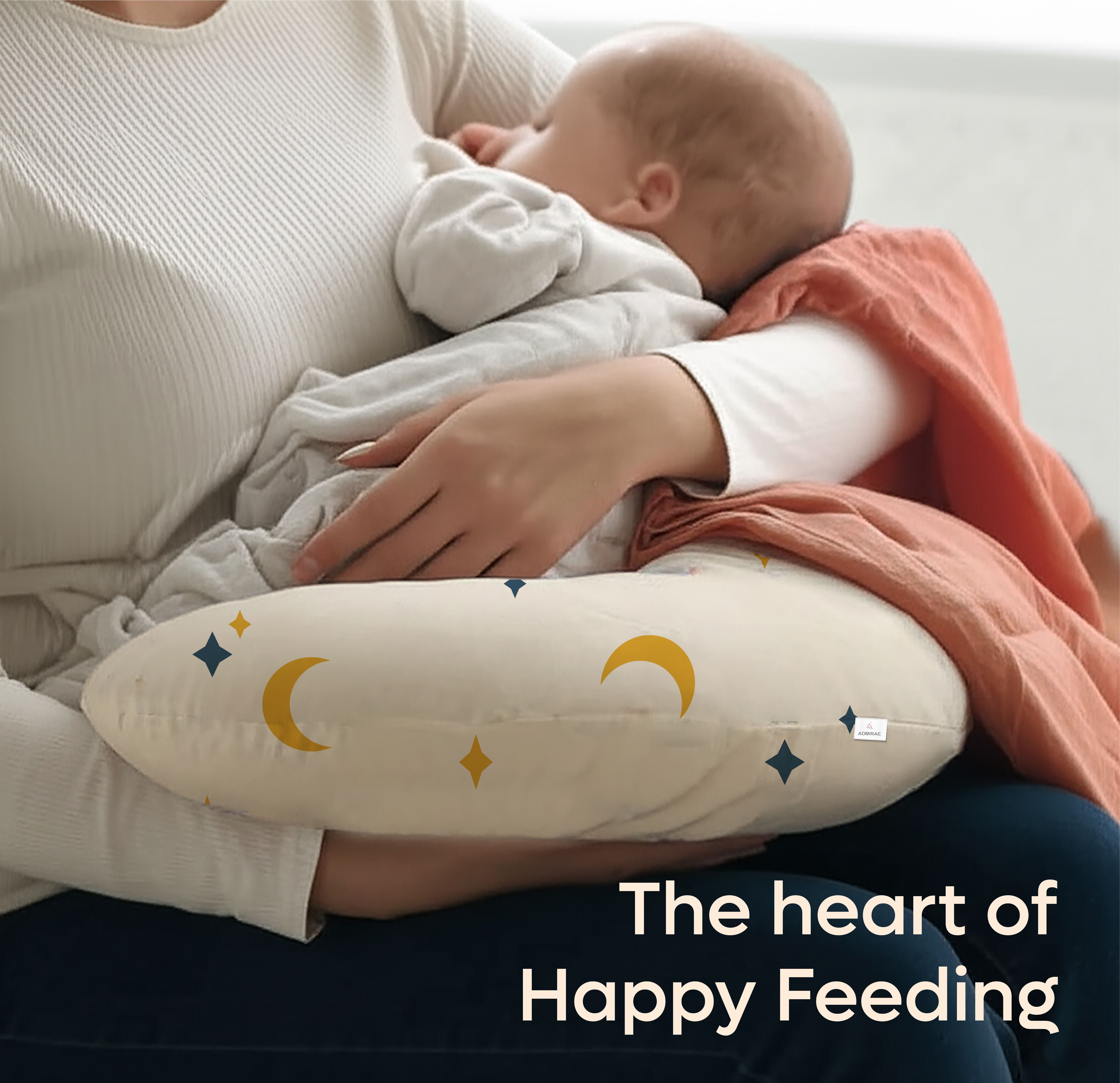 ADMIRAE Feeding Pillow for Baby with moon and star print supporting baby during feeding