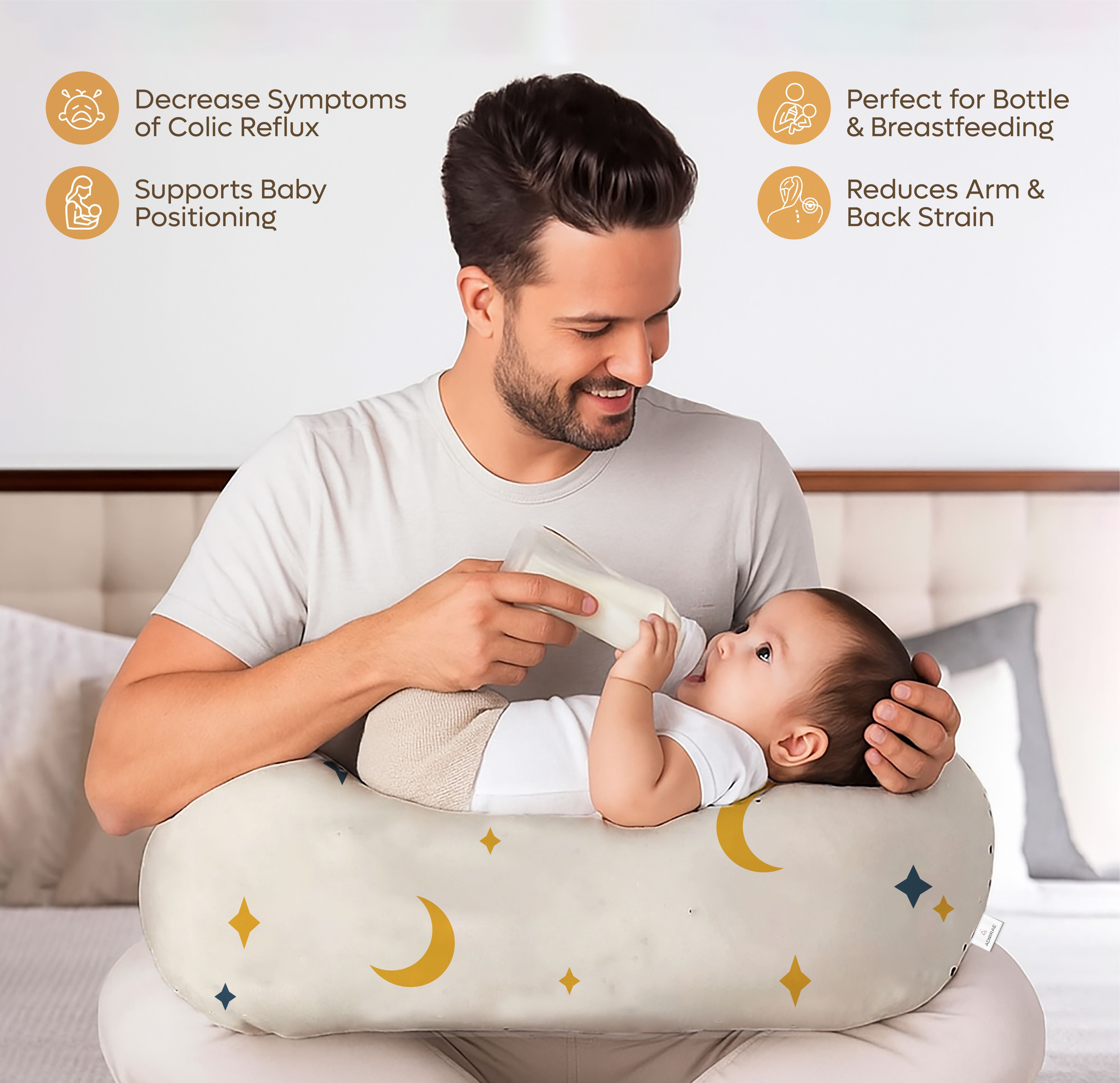 ADMIRAE feeding pillow for baby with moon and star design used by father to bottle feed infant comfortably