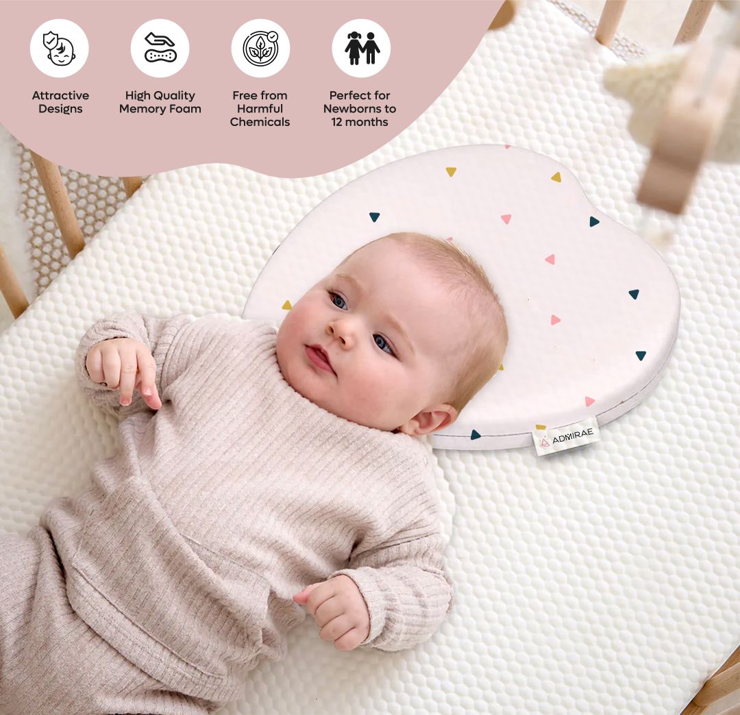ADMIRAE heart shape baby pillow with colorful triangle patterns supporting newborn baby head