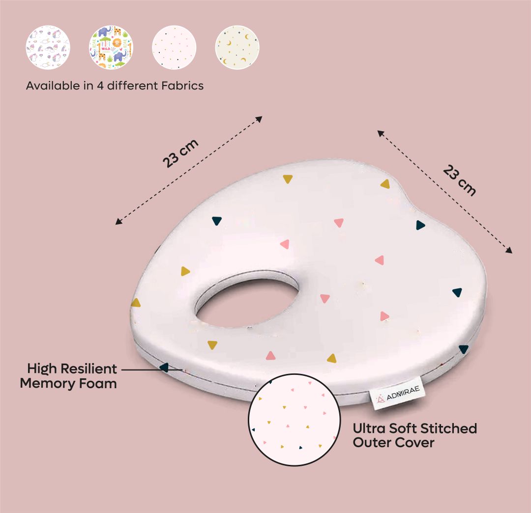 ADMIRAE heart shape baby pillow with memory foam and ultra soft stitched cover in white with small colorful triangles