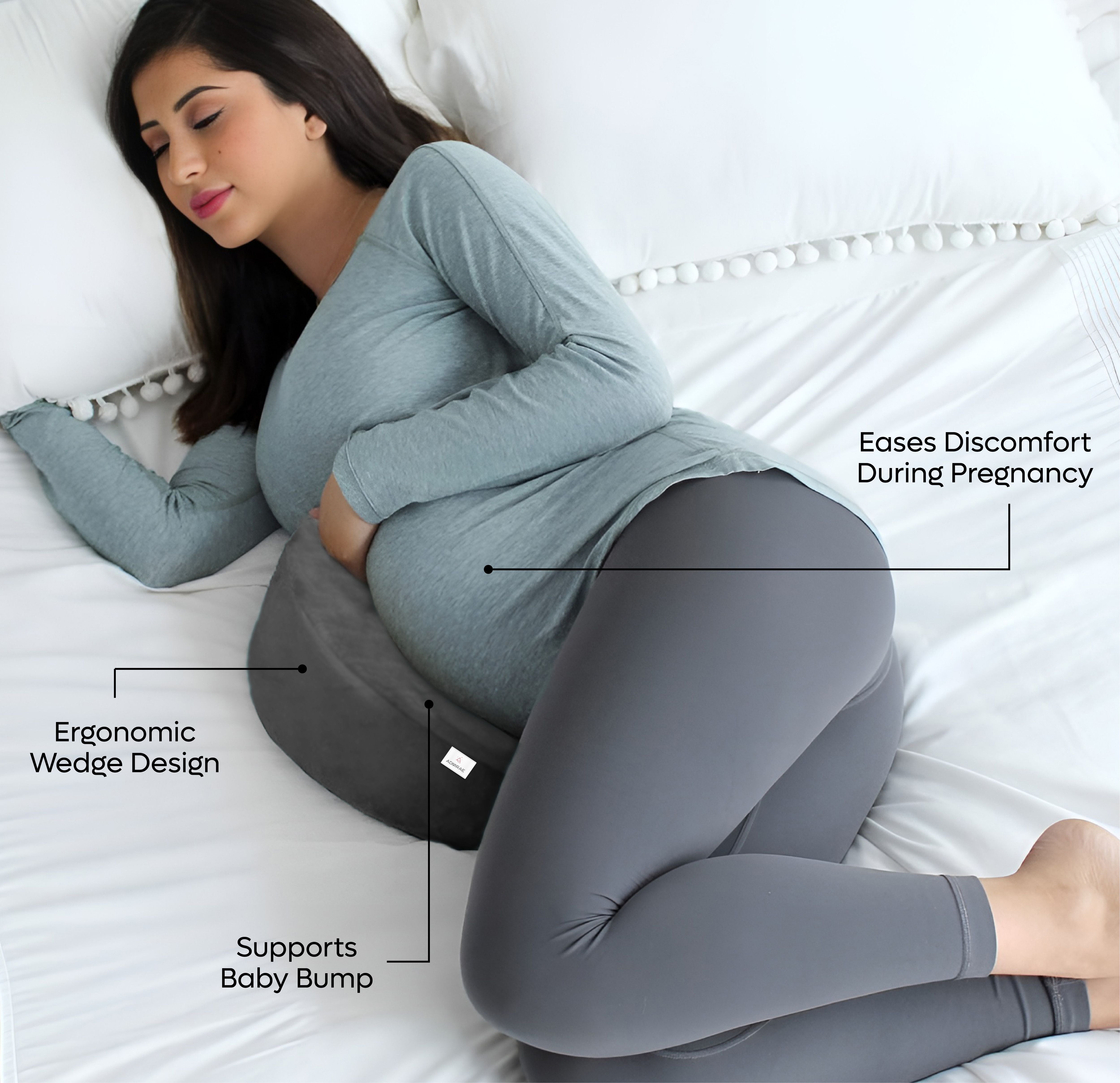 ADMIRAE memory foam pregnancy pillow with ergonomic wedge design supporting baby bump and easing discomfort
