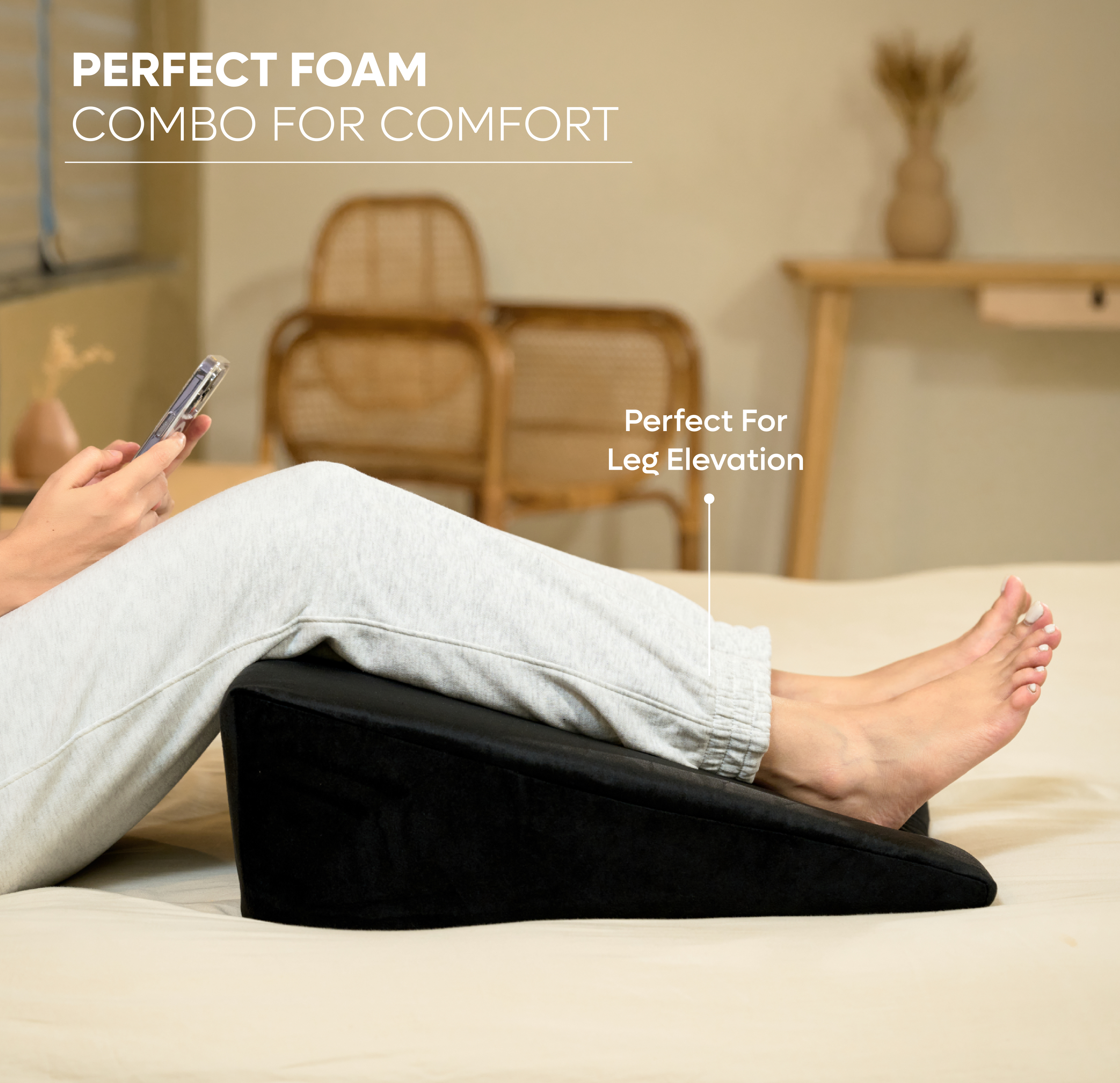 ADMIRAE memory foam wedge cushion in black used for leg elevation and comfort while resting