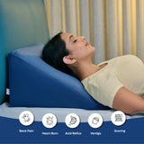 ADMIRAE memory foam wedge pillow in blue supporting a woman reclining for back pain and acid reflux relief