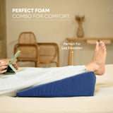 ADMIRAE memory foam wedge pillow in blue supporting elevated legs for comfort and leg elevation