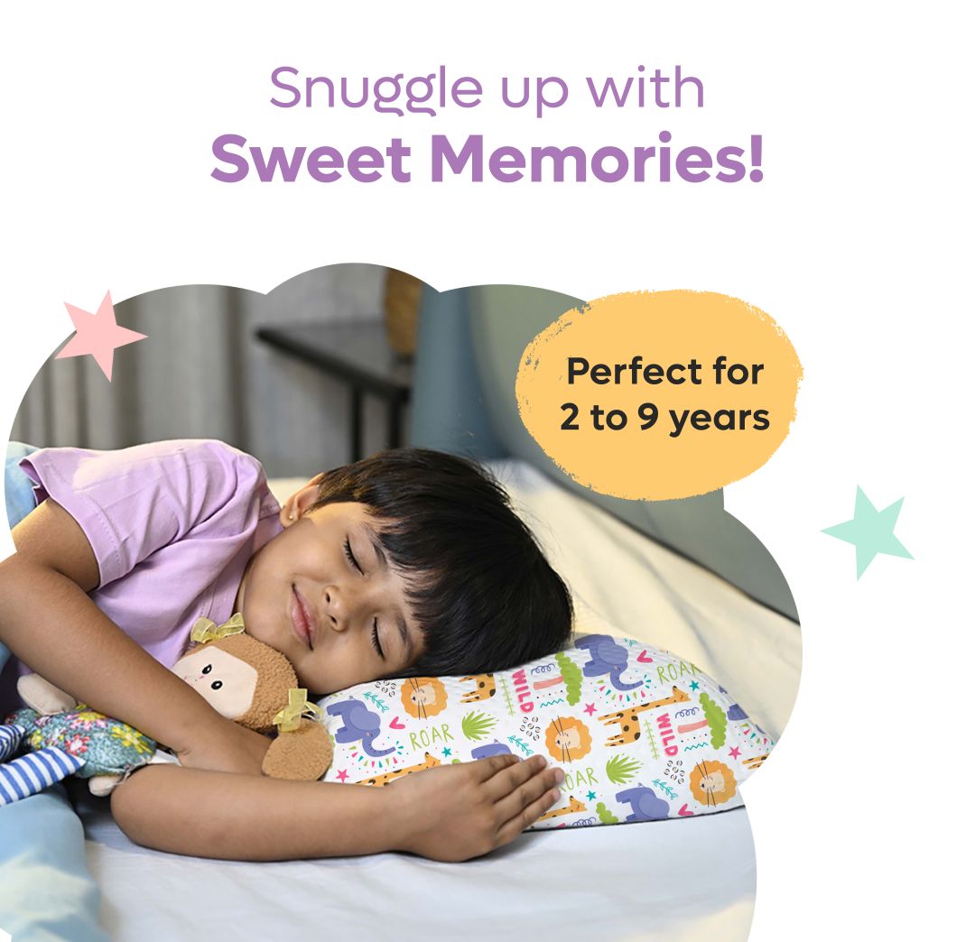 Child sleeping comfortably on colorful memory foam baby pillow with animal prints
