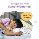 Child sleeping comfortably on a memory foam baby pillow with unicorn prints for ages 2 to 9 years